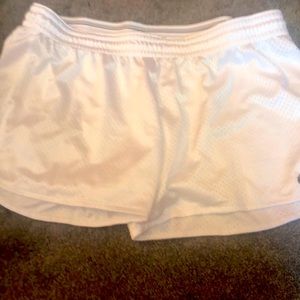 White Nike shorts